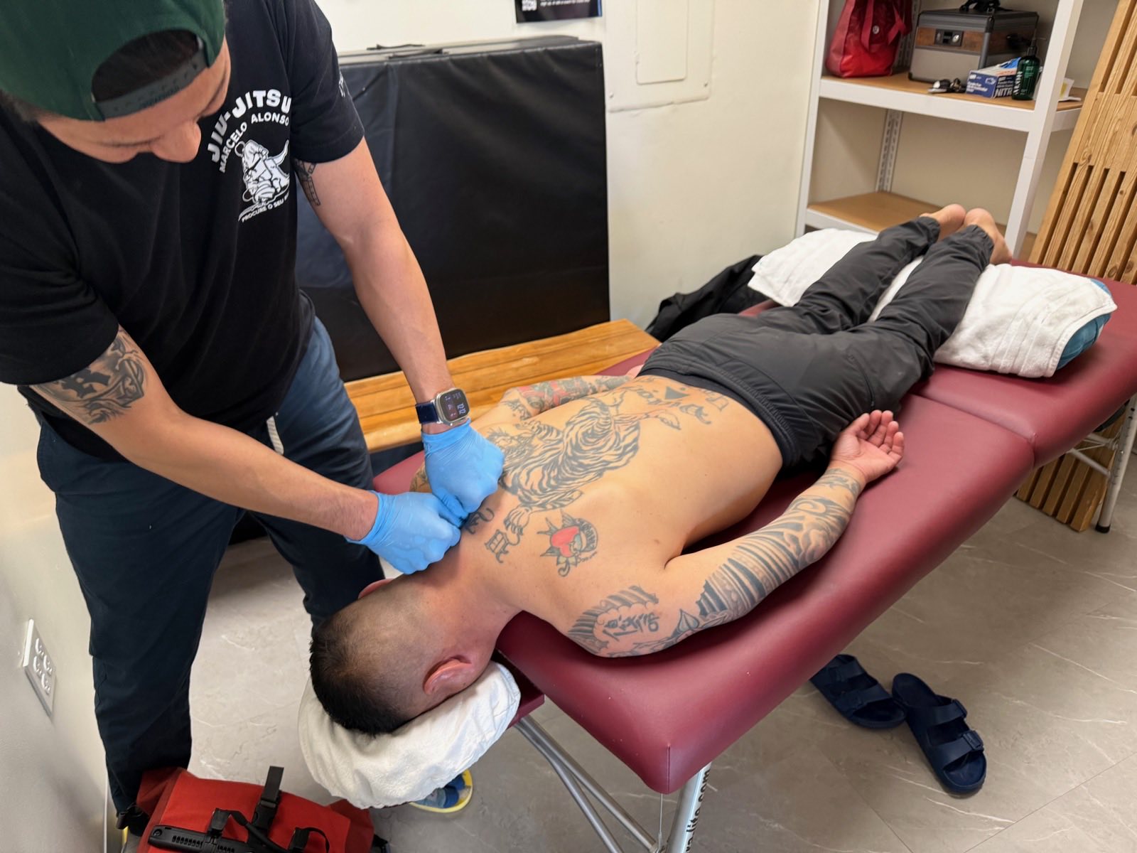 Brian performing soft tissue work on a patient's back